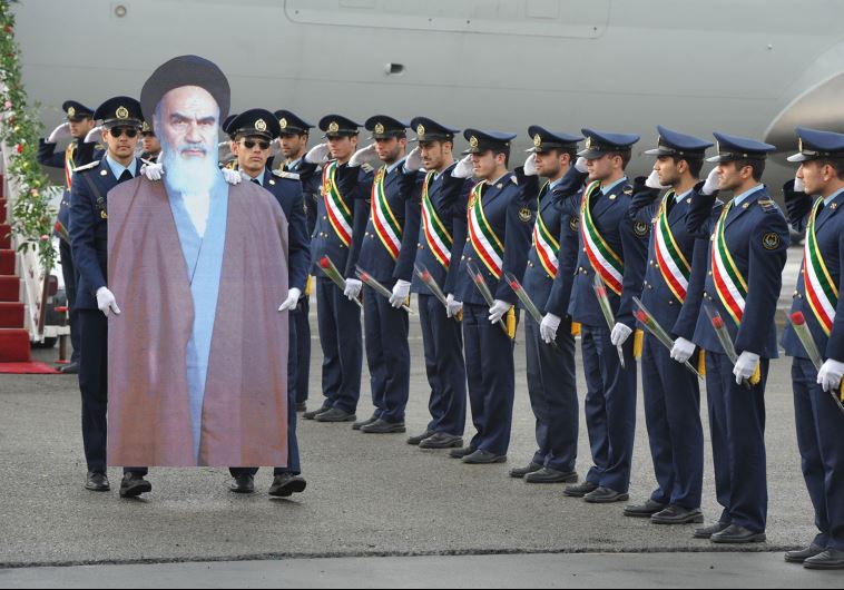 Members of the Iranian air force re-enact the scene of founder of the Islamic Republic Ayatollah Ruhollah Khomeini's arrival to Iran in 1979 at Merhrabad airport