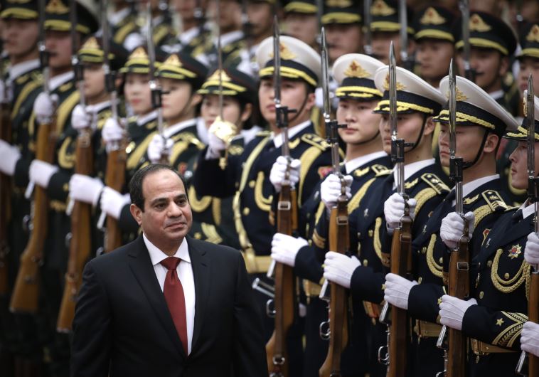 Egypt's President Abdel Fattah al-Sisi inspects honor guards in Beijing
