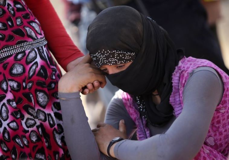 Yazidi refugee.