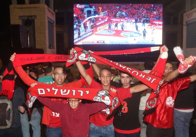 Jerusalem basketball fans gather to watch big game. 