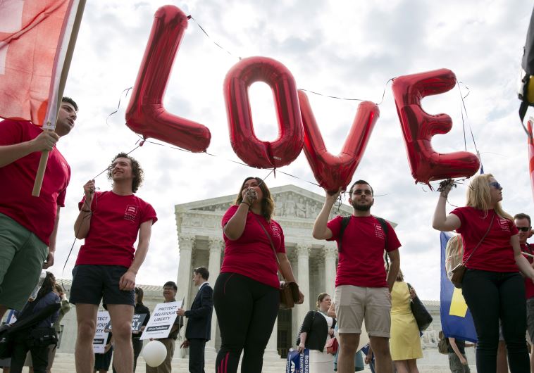 Supporters of gay marriage rally in front of the Supreme Court in Washington