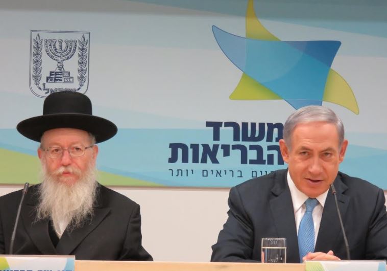 Prime Minister (and, formal) Health Minister Benjamin Netanyahu (R) and Deputy Health Minister MK Ya’acov Litzman