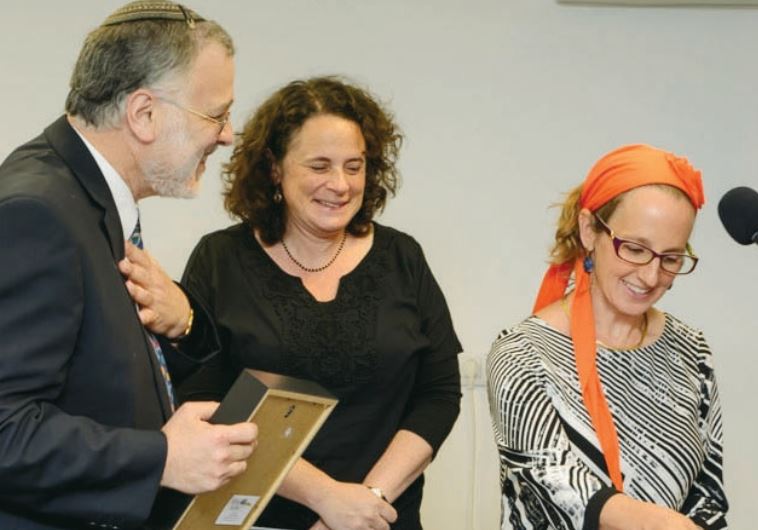 Rabbi Herzl Hefter congratulates Rahel Berkovits and Dr. Meesh Hammer-Kossoy on achieving smicha, becoming rabbis, or called ‘rabba.’