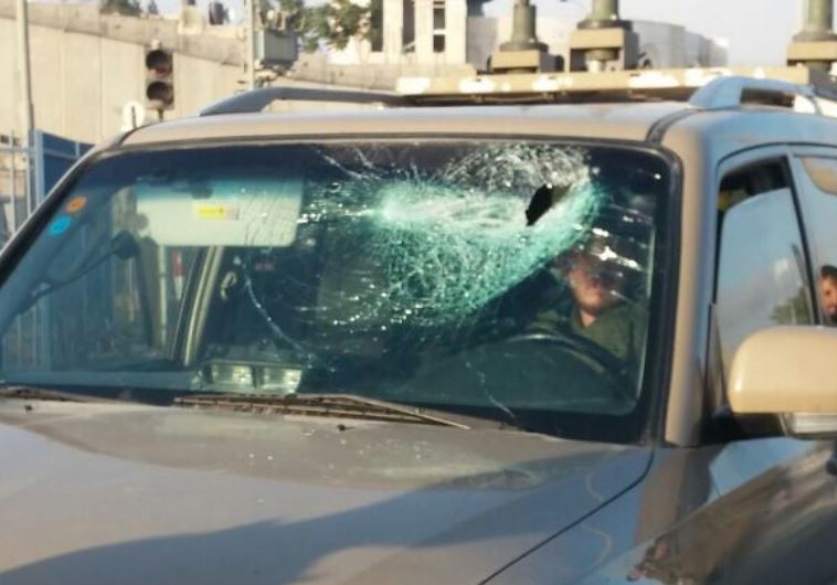 Smashed windshield of IDF vehicle