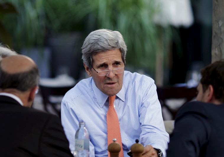 US Secretary of State John Kerry meets with US delegation to Iran talks on the terrace of a hotel where the negotiations are being held in Vienna, Austria July 2, 2015.