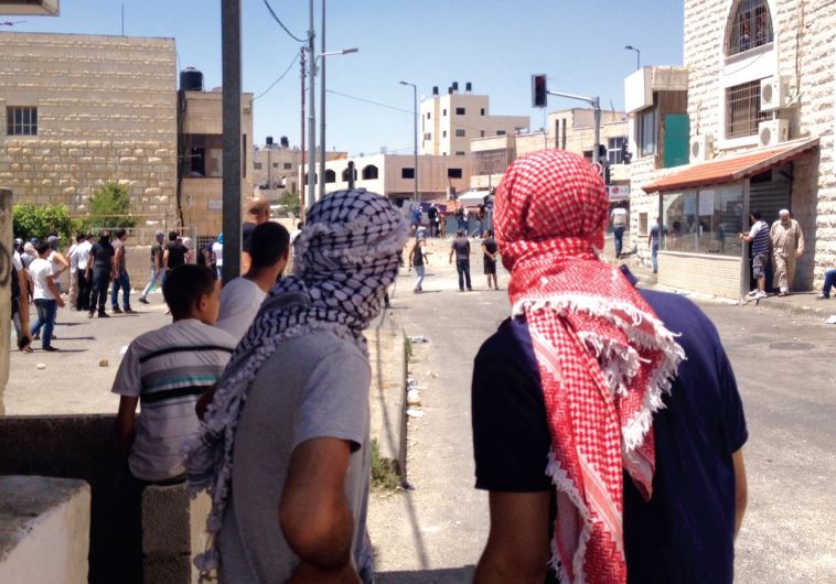 Rock-throwing in east Jerusalem in July 2014.