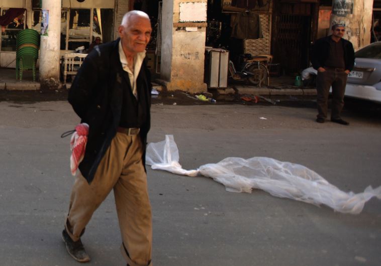 Ramshackle al-Rasheed Street, in the heart of old Baghdad.