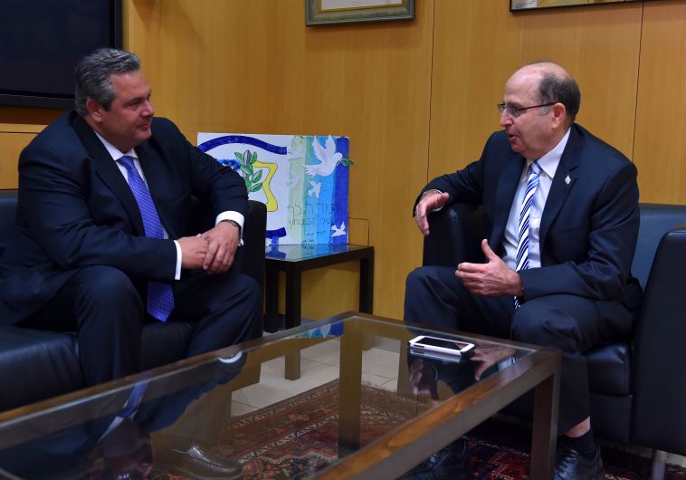 Greek Defense Minister Panos Kammenos visits his Israeli counterpart Moshe Ya'alon at the Defense Ministry