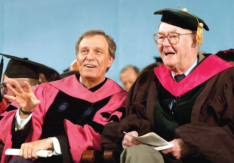 FORMER HARVARD University President Neil Rudenstine, left, and former New York Senator Daniel Patrick Moynihan share a laugh prior to Harvard University’s 351st commencement in Cambridge in 2002