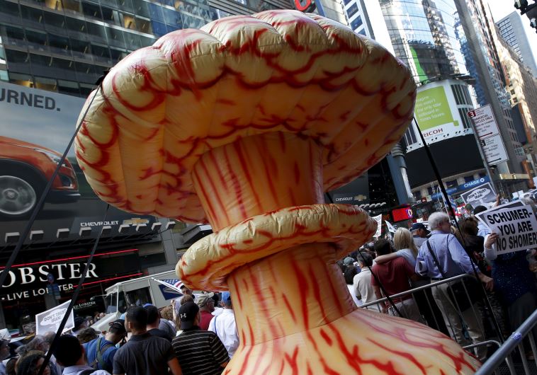 An inflatable mushroom cloud stands among demonstrators during a rally opposing the nuclear deal with Iran in Times Square