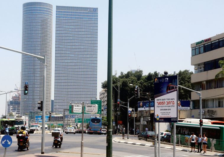 A sign warns of upcoming light rail construction on Tel Aviv's Hamasger Street