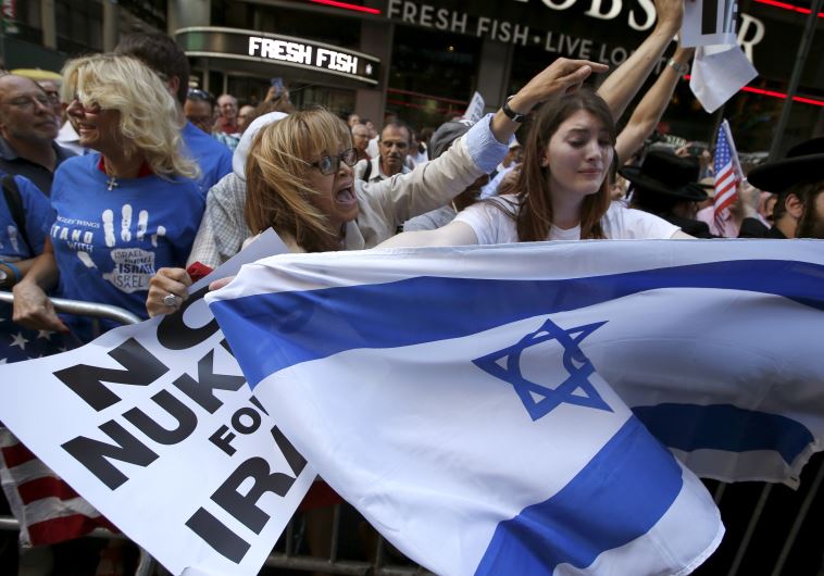 Protestors shout slogans as they demonstrate with thousands of others during a rally apposing the nuclear deal with Iran in New York