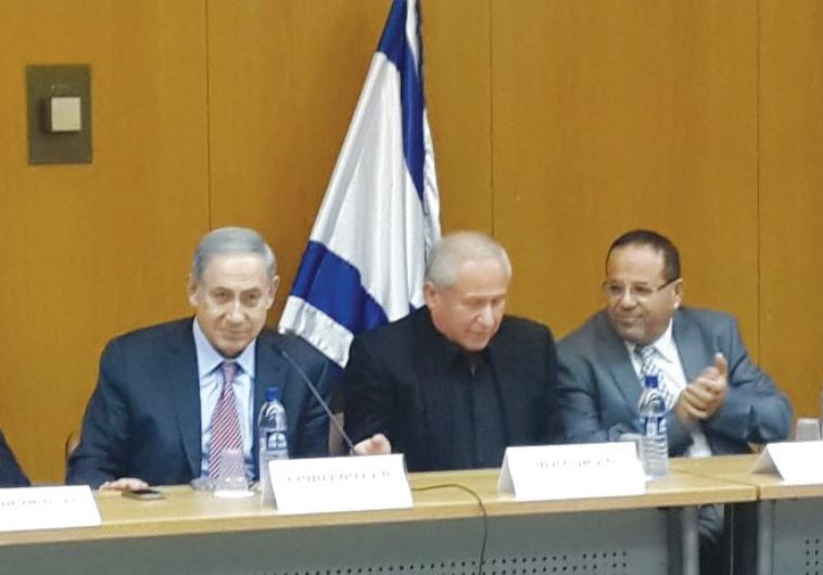 Netanyahu, Likud Deputy Minister Ayoub Kara (right), and MK Avi Dichter meet with Druse students in the Knesset on Monday.