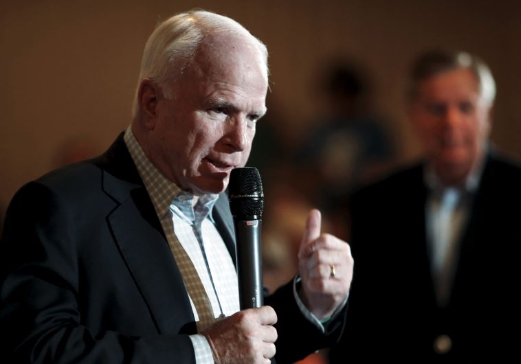 Arizona Senator and 2008 Republican presidential nominee John McCain speaks at a campaign town hall event for South Carolina Senator and U.S. Republican presidential candidate Lindsey Graham in Manchester, New Hampshire