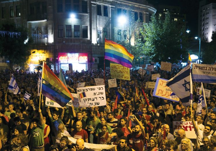 Protesters gather in Jerusalem on Saturday night after the Gay Pride Parade stabbings.