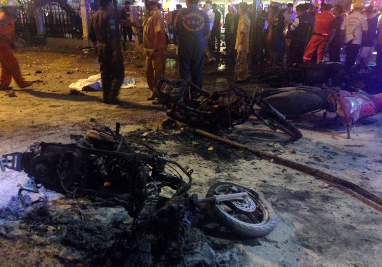 Destroyed motorbikes are pictured at the scene of devastation after a bomb exploded outside a religious shrine in central Bangkok late on August 17, 2015