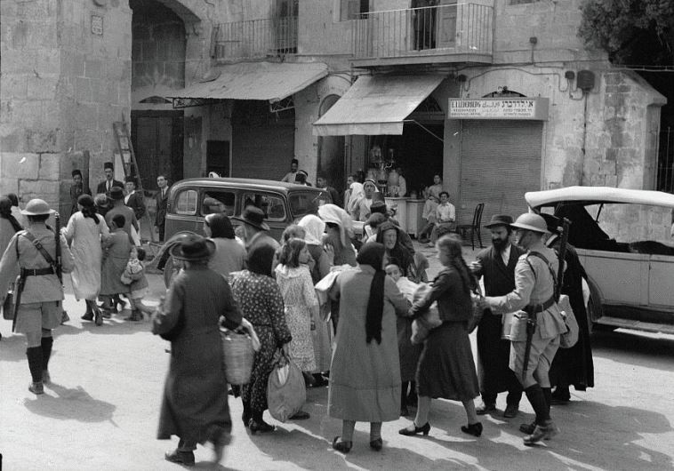 Jews evacuate the Old City of Jerusalem after Arab riots in 1936