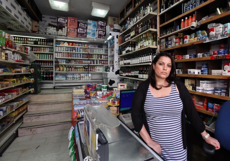 AN EMPLOYEE of the Makolet 24-hour market on Hillel Street, one of the eight markets being forced by the Jerusalem Municipality to close during Shabbat next month
