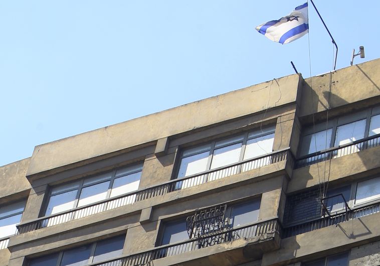 An Israeli flag flies at the top of the Israeli embassy in Cairo August 19, 2011