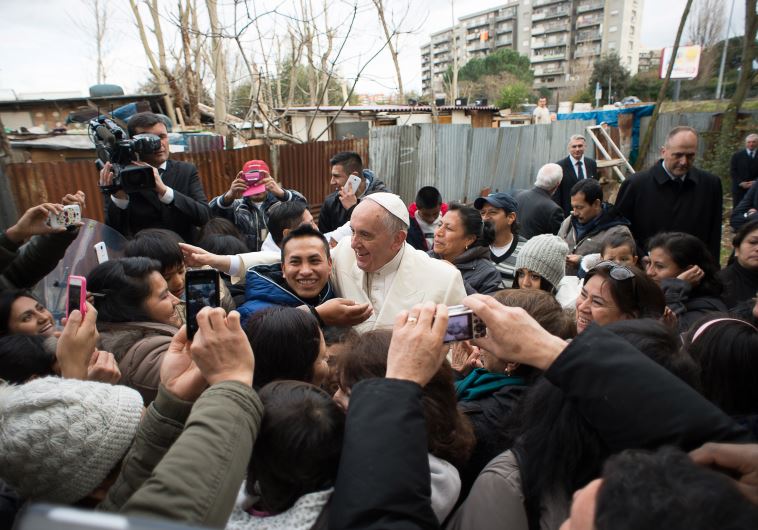 Pope Francis during a visit in a refugee camp on February 8, 2015 in Rome.