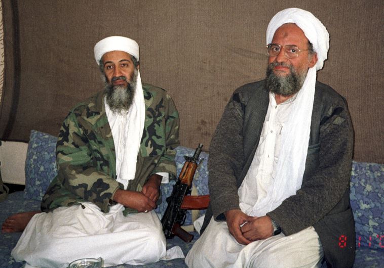 Osama bin Laden (L) sits with his adviser and purported successor Ayman al-Zawahri