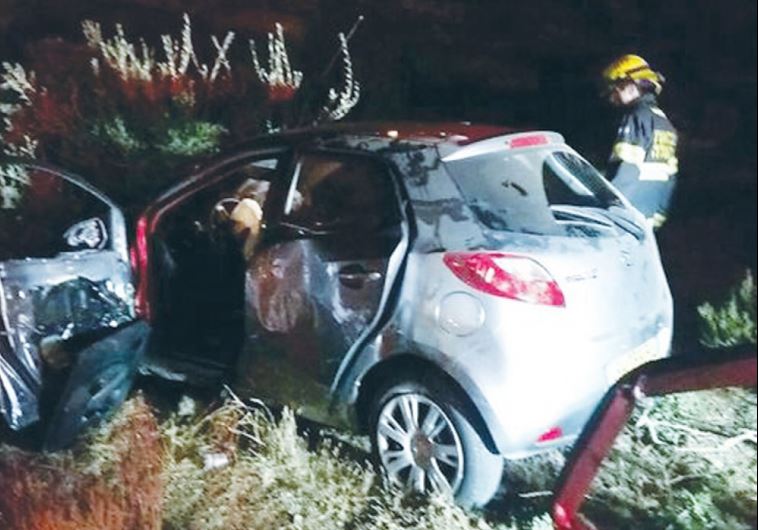 THE CAR Alexander Levlovitz (inset) was driving is seen after his fatal collision