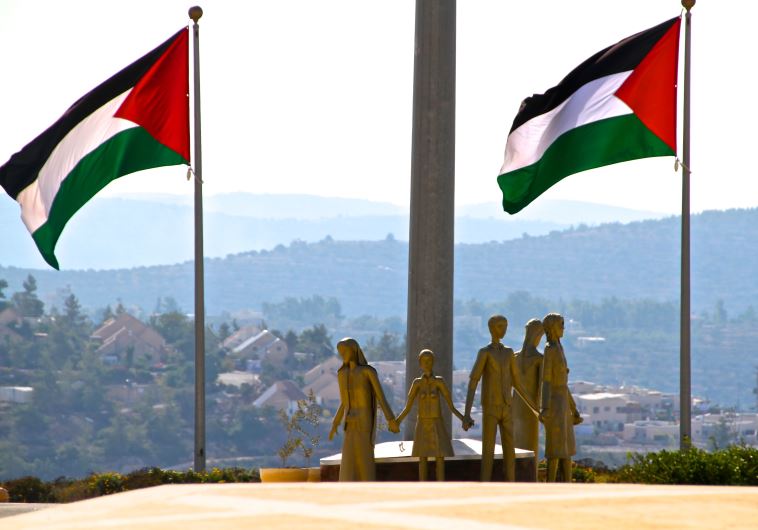Palestinian flags flying by the Rawabi visitor center in the West Bank