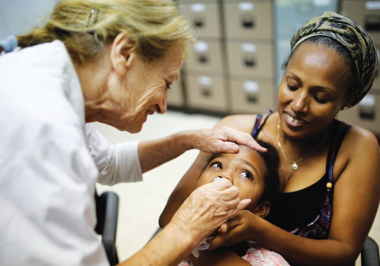 AN ISRAELI CHILD receives the polio vaccine in 2013