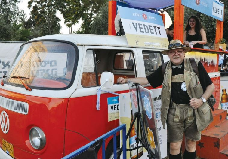 Conrad Seidl (the ‘beer pope’) in his Tyrolean lederhosenat the Jerusalem Beer Festival