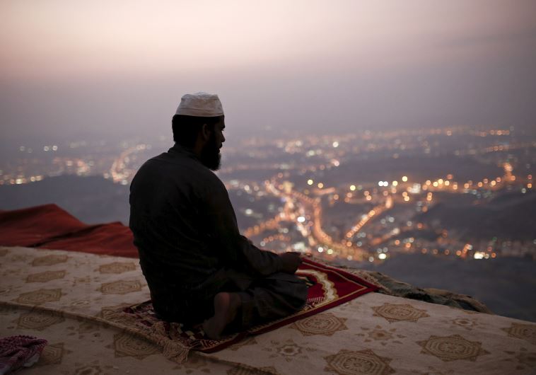 A Muslim pilgrim prays atop Mount Thor in the holy city of Mecca ahead of the annual hajj pilgrimage