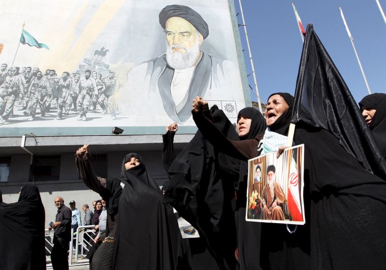 Iranian worshipers in Tehran chant slogans during a protest against Saudi Arabia after Thursday's crush that killed 131 Iranians at the haj pilgrimage