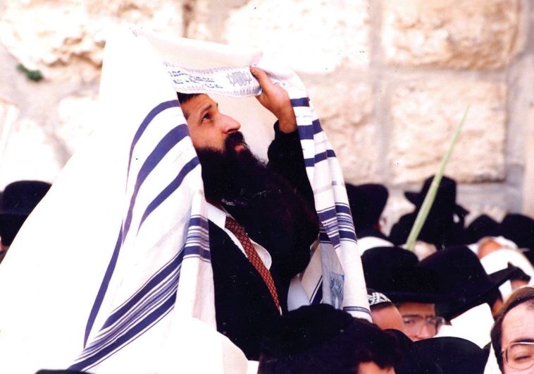 Prayers at the Western Wall during Succot, 1997. Jews from all over Israel and around the world have converged upon Jerusalem to rejoice in the festival