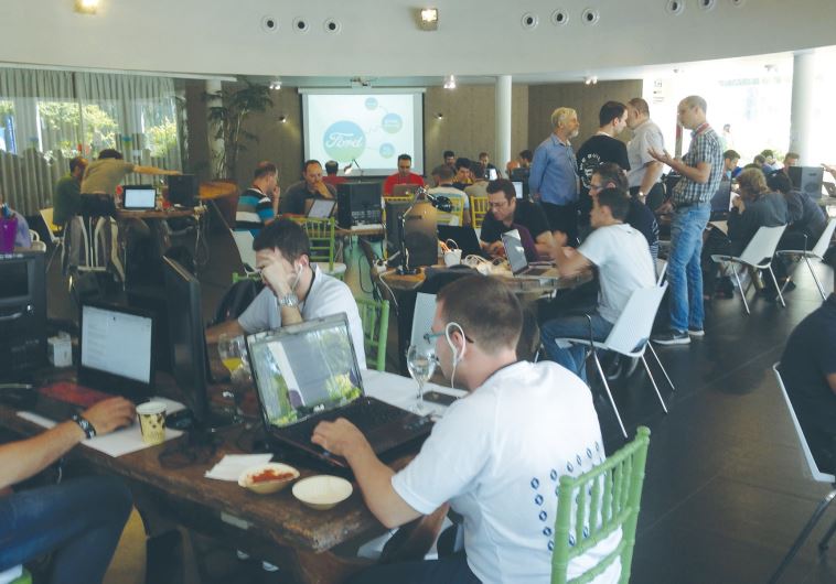 DEVELOPERS PROGRAM at Ford’s hackathon in Tel Aviv yesterday. The winner of Ford’s first hackathon will drive off in a new car, but many of the participants will leave with advanced ideas for apps, services or features compatible with Ford’s SYNC AppLink system, which can load up specially formatted