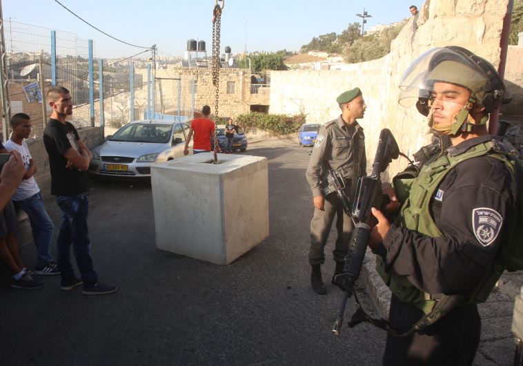 Concrete barriers set up in east Jerusalem neighborhoods