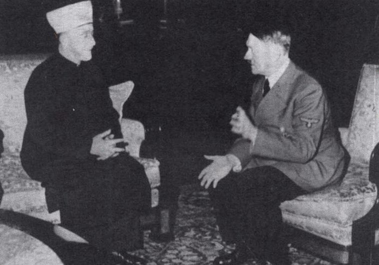 German dictator Adolf Hitler (R) and the grand mufti of Jerusalem, Haj Amin Al-Husseini, meet in Berlin on November 30, 1941