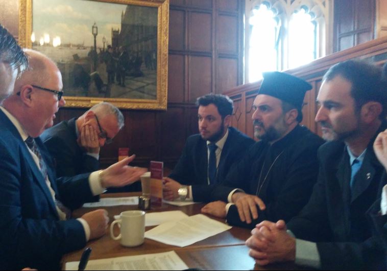 Father Gabriel Naddaf meets government officials in London