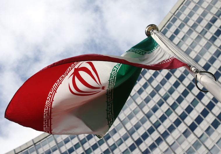An Iranian flag flutters in front of the United Nations headquarters