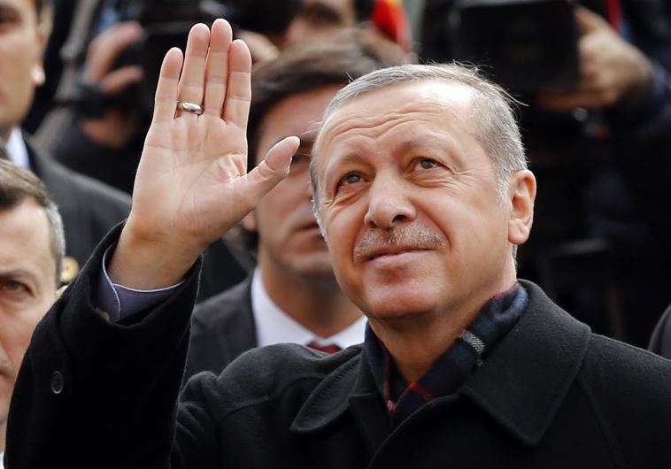 Turkish President Tayyip Erdogan greets his supporters