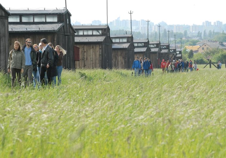 University students on the March of Remembrance and Hope visit the barracks at Majdanek concentration camp, located on the outskirts of Lublin, Poland
