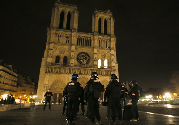 Police patrol near Notre Dame Cathedral following a series of deadly attacks in Paris , November 14, 2015