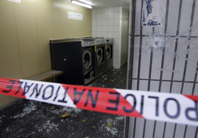 A launderette remains closed two days after an attack close by, in central east Paris, on November 15, 2015