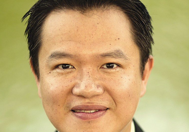 CONDUCTOR AND composer Yi-An Xu.
