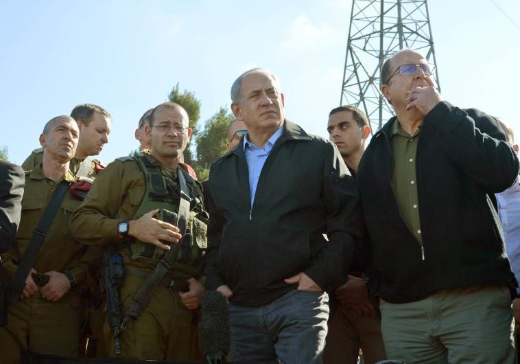 Prime Minister Benjamin Netanyahu and Defense Minister Moshe Ya'alon during a visit to the Gush Etzion Junction.