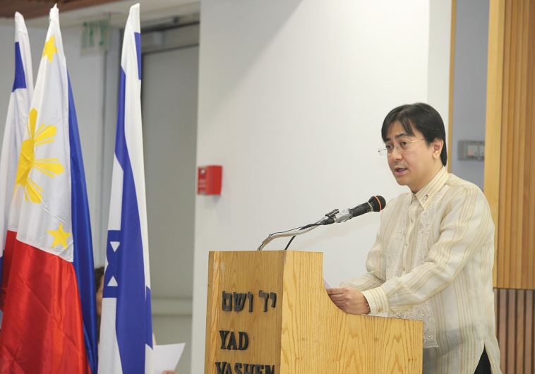 PHILIPPINE AMBASSADOR to Israel Nathaniel Imperial delivers an address at a Yad Vashem  