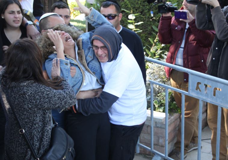 Ziv Mizrahi's mother at his funeral.