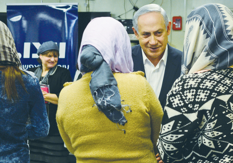 PRIME MINISTER Benjamin Netanyahu meets with women living at a WIZO and government sponsored shelter for victims of domestic violence, during a tour marking International Day for the Elimination of Violence Against Women.