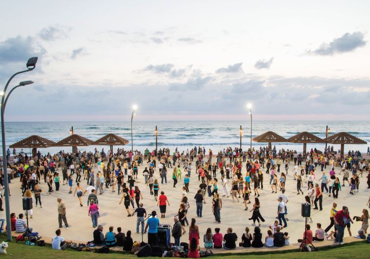 Dancing on the shore of Haifa beach