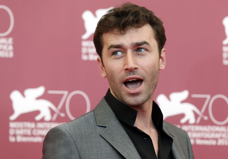 Actor James Deen poses during a photocall during the 70th Venice Film Festival in Venice August 30, 2013. 