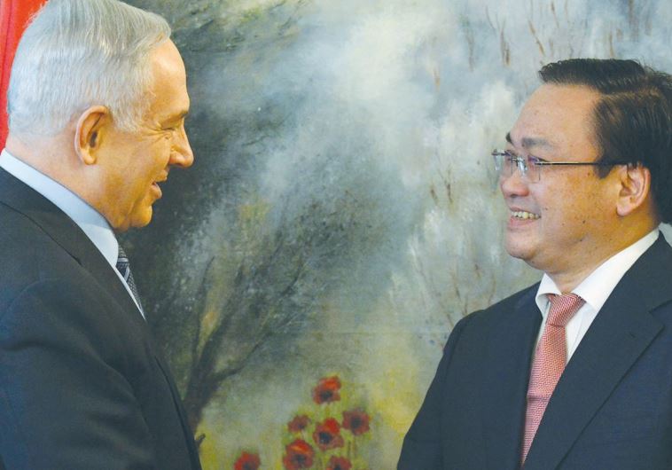 PRIME MINISTER Benjamin Netanyahu greets Vietnamese Deputy Prime Minister Hoang Trung Hai at the Knesset this week.