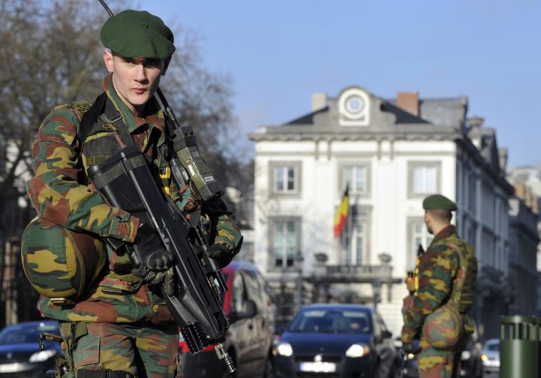 Belgian soldiers guard outside the U.S. Embassy in Brussels